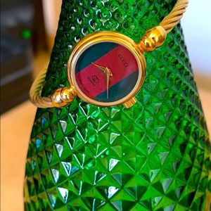 Vintage Gucci gold bangle watch.